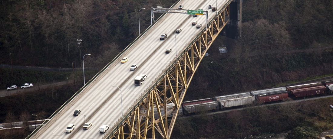 Image - bridge with cars and railcars