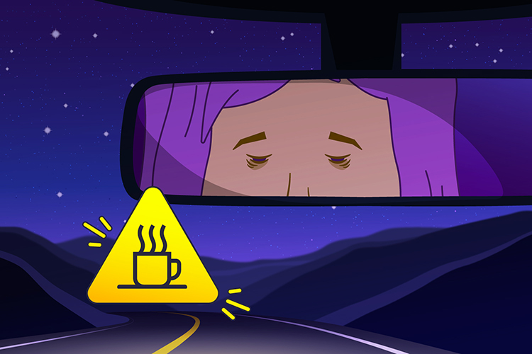 A tired driver is alerted by a visual icon showing a coffee cup.