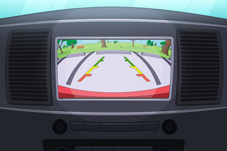 A screen on a vehicle’s dashboard shows the view behind vehicle as it reverses into a parking spot.