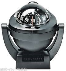 Image of a standard magnetic compass with mounting